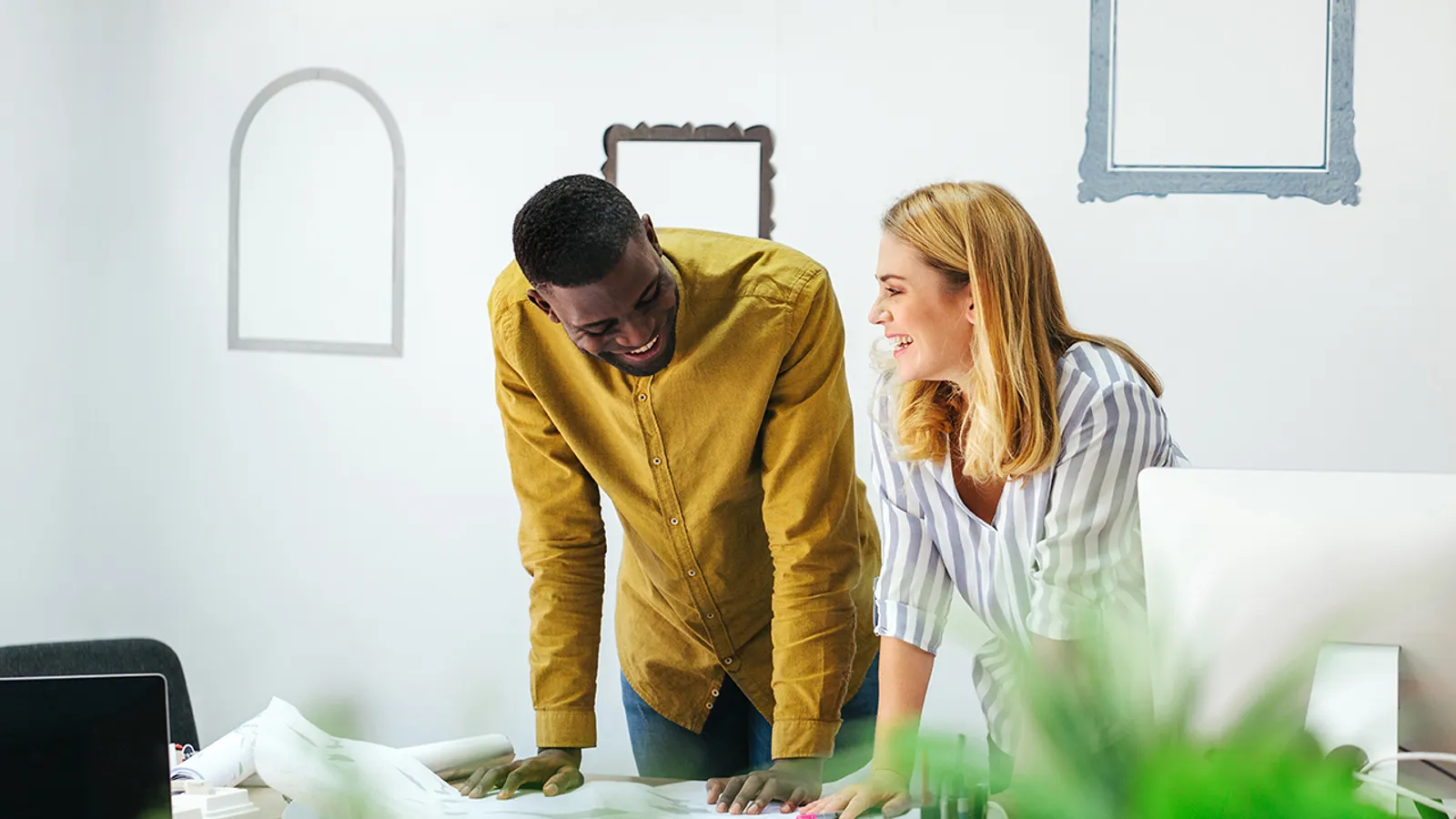Two designers discussing a project