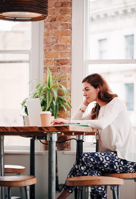 Woman working on website